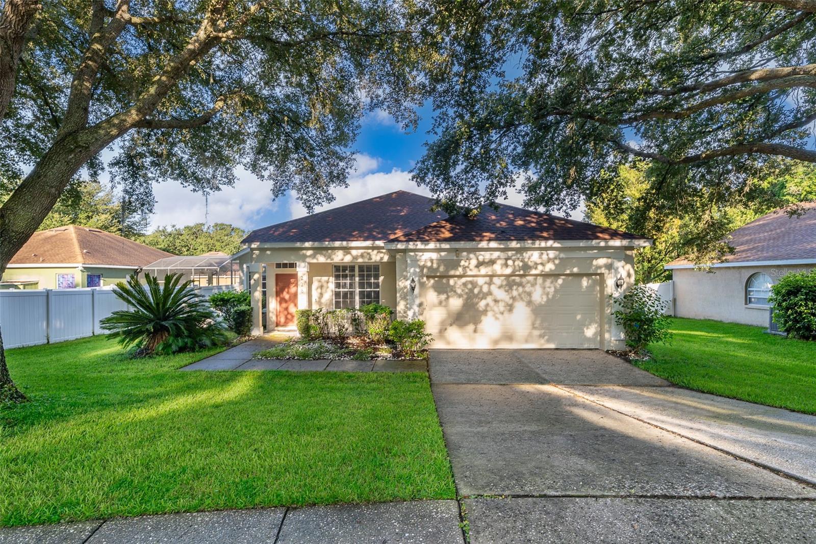 FRESHLY PAINTED with NEW ROOF & HVAC!
Welcome home to this well-maintained 3-bedroom, 2-bathroom cul-de-sac gem in desirable Remington Oaks. Featuring a split bedroom floor plan, this spacious home offers multiple living areas including formal living, dining, and family rooms — perfect for both entertaining and everyday living.
The bright, eat-in kitchen is equipped with stainless steel appliances, a pantry, breakfast bar, and ample cabinetry. Fresh interior and exterior paint complement the hardwood and tile flooring throughout — NO CARPET in sight!
The private primary suite boasts a dual vanity, garden tub, and walk-in shower. Enjoy the outdoors year-round with a covered and screened-in patio overlooking a large, fully fenced backyard. A 2-car attached garage completes the home.
Remington Oaks HOA amenities include a community pool and tot lot, located just across Hackney Prairie Road within the extended neighborhood. Just steps away, Prairie Lake Park offers lakeside recreation, including fishing, basketball, volleyball, disc golf, playgrounds, and open play areas. You're also just about a mile from the West Orange Trail for biking, walking, and enjoying miles of Florida sunshine.