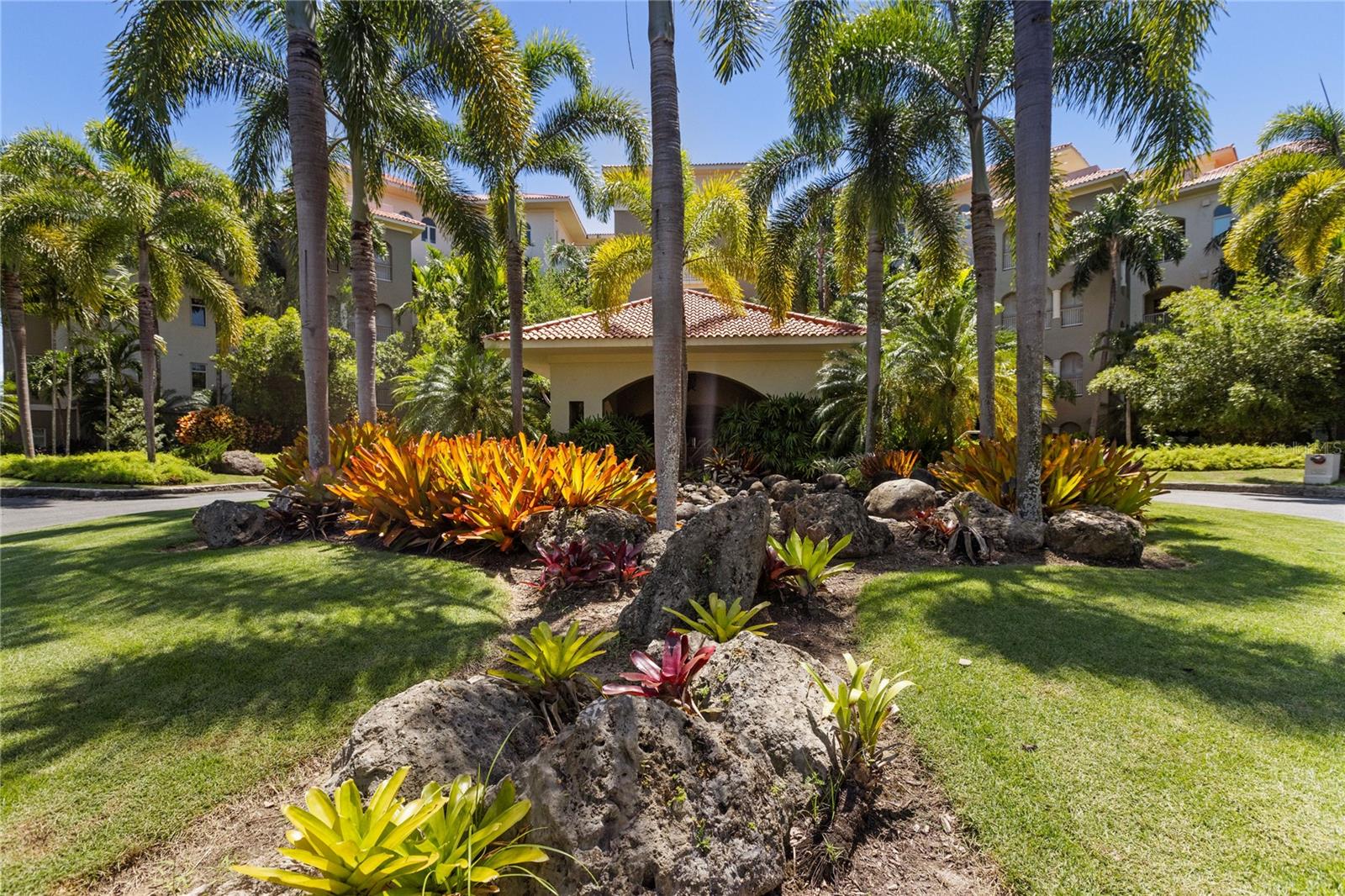 Experience luxury like no other in this stunning Plantation Village sub-penthouse within the acclaimed gates of Dorado Beach Resort and Club, in the heart of the resort. This two-story residence features a unique and highly sought-after floor plan designed for both comfort and style, with ample storage space throughout.
Overlooking the Sugar Cane Golf Course, mountains, and the new farm, the property offers breathtaking views from its two spacious balconies, perfect for lounging and entertaining.
The first floor features a spacious open-concept, high-ceiling living area, complete with an expansive, fully equipped kitchen, a bar, and a dining table that comfortably sits 8. A generously sized balcony provides additional space for dining and relaxation, seamlessly connecting the indoor and outdoor living areas to create the perfect environment for gatherings.
Upstairs, the primary and a large secondary bedroom ensure privacy and comfort, each featuring en-suite spa-like bathrooms with his and hers sinks, as well as both shower and bathtub options, offering views of the serene golf course. The two other secondary bedrooms are located on the first floor, each with its own en-suite bathroom, providing both space and convenience.
A secondary living area on the upper floor, complete with a fully equipped bar and another comfortable balcony with panoramic views, adds to the versatility of this exceptional home.
With 3,690sqft of interior space and 371sqft of covered terraces, a garage for two cars and two (2) golf cart parking spaces, and access to the world-class amenities of Dorado Beach Resort (including golf courses, fitness centers, tennis courts, and The Watermill Aquatic Park) this penthouse offers the ultimate resort lifestyle.
This property’s captivating views, luxurious design, abundant storage, and unique privacy make it an exceptional opportunity that won’t last long on the market.