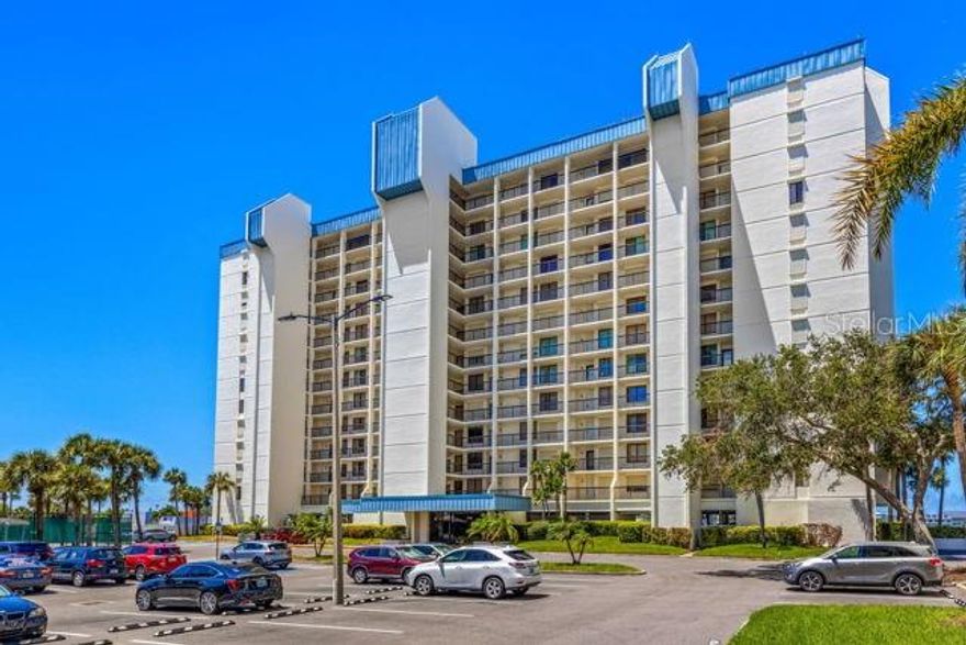 RENTAL available in May 2025 in the Yacht & Tennis Club in stunning St. Pete Beach, FL! This enchanting waterfront 2 bed/2 bath rental offers an open floor plan and spectacular western views of the Gulf and Intracoastal Waterway with front row seats to near daily sunsets. There is space to enjoy ultimate relaxation on the balcony which is also accessible straight from the cozy master bedroom, along with a roomy walk-in master closet, and the convenience of your own washer and dryer in the unit.  An updated kitchen is there if you enjoy cooking, but no worries, there are exceptional local restaurants just a short stroll away if you prefer dining out. YTC offers some of the best luxury amenities and location in the area - take a dip in the waterfront heated pool, or unwind in the soothing waterfront hot tub. Enjoy a sauna after your workout in the community’s state-of-the-art fitness center with a soothing view of the Intracoastal. Stay active and socialize with friends on the tennis courts or pickleball courts and take advantage of the many social activities in this welcoming, socially active gated community. MAY-DECEMBER 2025 ONLY. Schedule your in-person or remote tour today!
