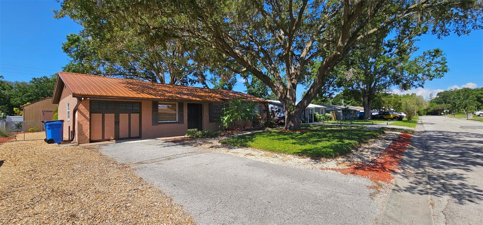 Your Lutz Home Awaits! No HOA, Low Maintenance & Full of Charm! Welcome to your dream home tucked away in the heart of Lutz, Florida! Located on a peaceful, no-outlet street, this lovingly maintained residence offers the perfect blend of serenity, practicality, and convenience.{Peace of Mind & Easy Living}
Owned and cared for by the same family for 22 years, this home features a beautifully xeriscaped yard designed for low-maintenance living. Decorative slate rock, drought-tolerant plants (including Jasmine Minimus around the front tree), and two large tree canopies create inviting curb appeal while helping to keep the home cooler year-round. The durable metal roof adds an extra layer of energy efficiency – the current owners averaged electric bills of just $89.57 in 2024 and $92.76 in 2023 (actual usage may vary).{Inviting Interior & Modern Touches}
Inside, soft wood floors set a warm, welcoming tone. The freshly painted interior offers a neutral canvas ready for your personal style. In the kitchen, updated warm-toned slate taupe appliances (2020) add functionality and elegance to everyday cooking.
{Outdoor Enjoyment & Practical Features}
Beat the Florida heat in your private, screened-in back porch overlooking a generous fenced-in back yard providing a safe place for your toys, boat and more!. A spacious, air-sealed wood shed provides ample storage, while the one-car garage adds flexibility for secure parking or hobbies.
{Bonus Details & Smart Design}
This home is in Flood Zone X for added peace of mind and is close to an emergency evacuation site. Additional practical upgrades include: Water main on the opposite side of the street. Sewer lateral lines leading to a 13-14 ft. gravity main (cleanout marked 14’ from curb)Modified side gate for trailer access to the backyard. Nearby county-owned environmental preserve at the end of the street.
{Convenient Location}
Enjoy easy access to interstates and expressways for a stress-free commute, plus shopping, dining, and everyday conveniences just minutes away.
{Don't Miss Out!}
Affordable homes don't come up for sale very often in the highly desirable Steinbrenner School district and offered in an established neighborhood with no HOA to boot! Come see the potential and charm this Lutz gem has to offer!