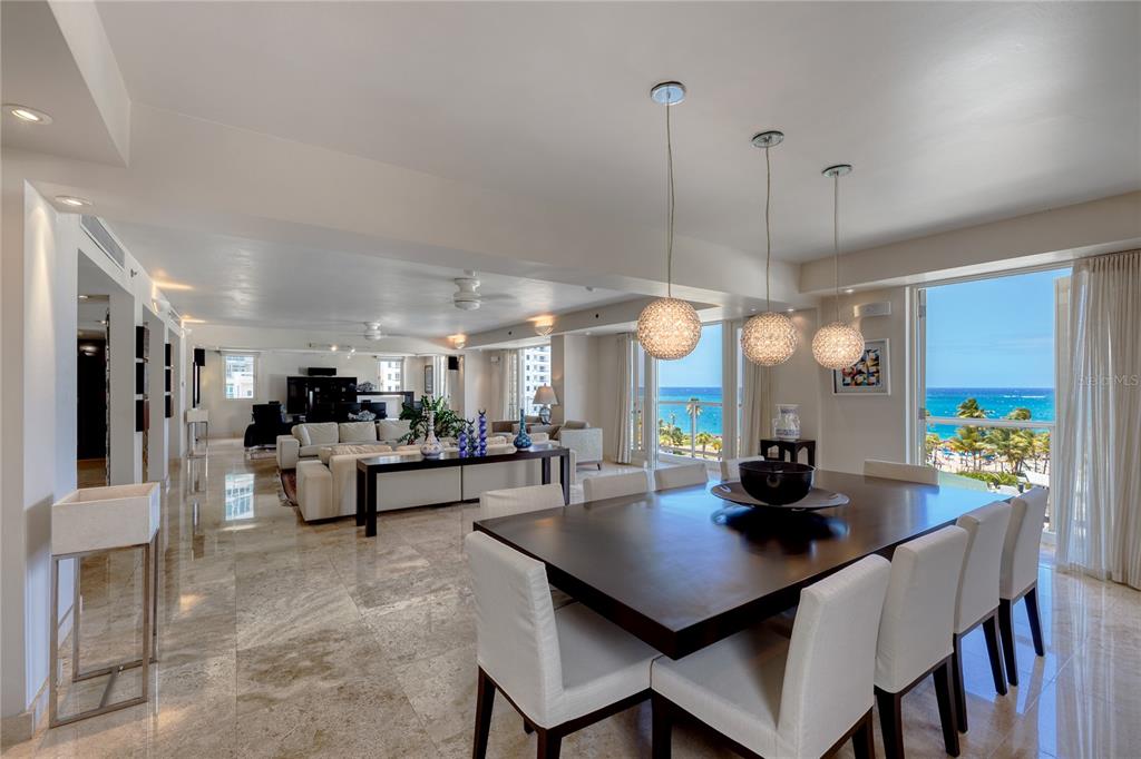 Windows to sea, this expansive open layout 7th floor residence at 1058 Ashford Avenue, spans the entirety of the building's footprint, offering 5 bed+ maids quarters, 4.5 bath with a total of 4,825 sq.ft with marble floors throughout. Steps from the sand, Sancti Spiritus Park is a boutique, key access building, featuring Caribbean contemporary design, gracious floor plans, and unobstructed ocean views facing Ventana Del Mar Park. The master suite has two envious walk-in closets along with a spacious en-suite bathroom. The kitchen offers a contemporary layout and design with stainless steel appliances as well as a sit up breakfast bar. All five bedrooms are accessible via the western corridor and are well off of the main living spaces.
Located In the heart of the Condado Beach district, the full floor residence offers private elevator access to your home's landing, large step out balconies from your living, dining and entertainment areas, and an abundance of natural light throughout, in one of San Juan’s most coveted addresses.
This very private and discreet building on Ashford Avenue designed and built by Alvarez-Diaz and Villalon architects, offers only 9 floors comprising 12 residences in total.
Annual Hazard Insurance: $11,741.
Annual Property Tax: $6,268.50.
Monthly Maintenance: $1,450.