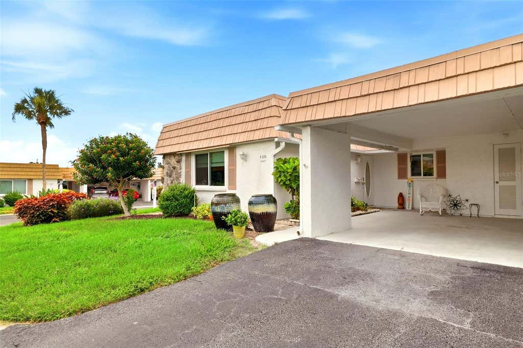 Photo of 2407 Riverbluff Parkway #V-226, Sarasota, FL 34231 (MLS # A4702996)