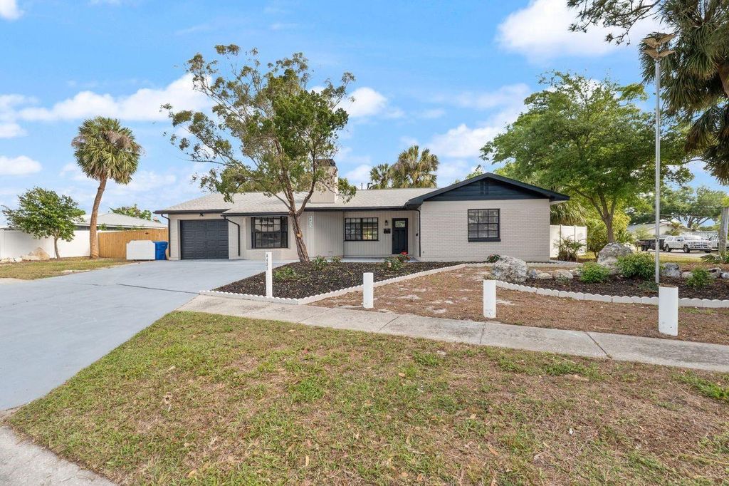 Photo of 4403 Golfwood Boulevard, Tampa, FL 33634 (MLS # TB8492871)