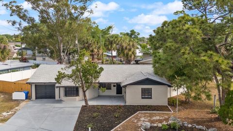 Photo of 4403 Golfwood Boulevard, Tampa, FL 33634 (MLS # TB8492871)