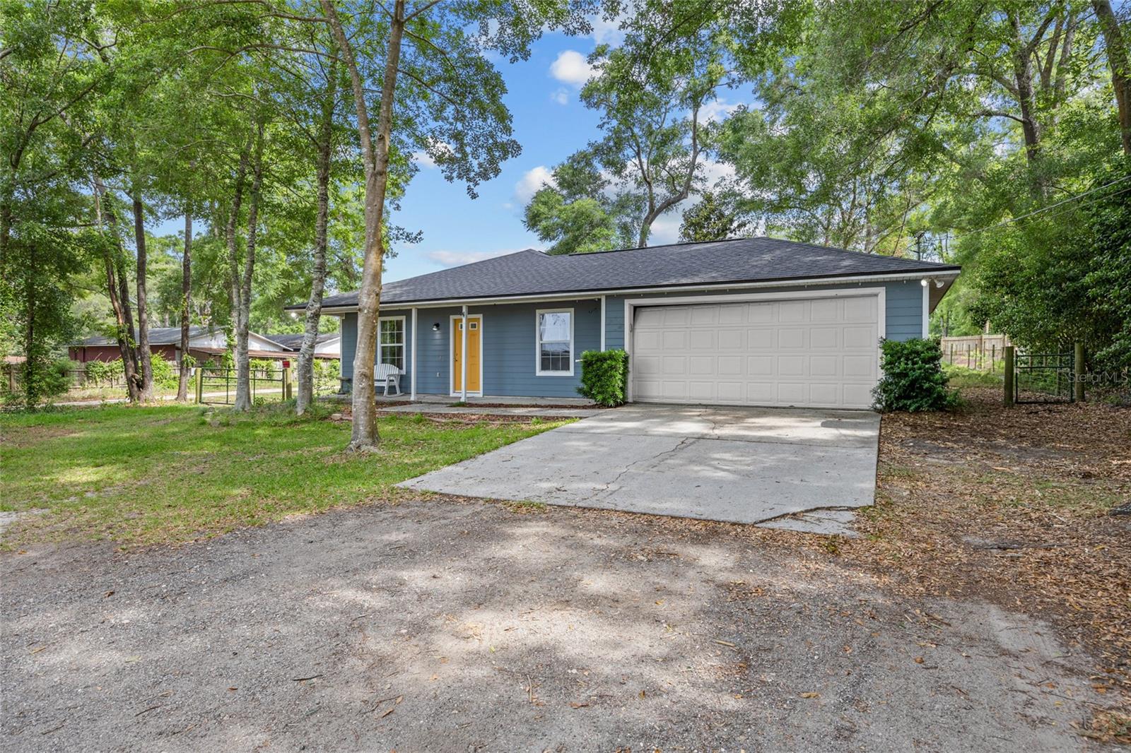 Beautifully Maintained 3-Bedroom, 2-Bathroom Home in a Prime High Springs Location
Nestled just off a paved road in a peaceful, private setting, this inviting residence offers the perfect balance of comfort, convenience, and charm. Featuring a new roof (2023) and a thoughtfully designed open floor plan, the home seamlessly connects the kitchen, dining, and living areas—creating an ideal space for everyday living and effortless entertaining.
The spacious kitchen is equipped with abundant counter space and ample cabinetry, offering both functionality and style. Sliding glass doors from the living area open to a covered backyard patio, perfect for enjoying your morning coffee, unwinding after a long day, or hosting gatherings with family and friends.
The fully fenced backyard provides a safe and versatile space for pets, gardening, and includes a dedicated storage shed for your tools and outdoor gear. With no HOA or deed restrictions, you’ll appreciate the flexibility to personalize and enjoy your property without limitations.
Zoned for highly rated High Springs schools and located just minutes from the region’s breathtaking natural springs and rivers, this home is a haven for outdoor enthusiasts. All of this, just 20 minutes to Gainesville, offering convenient access to top-tier hospitals, the University of Florida, shopping, dining, and more.
This move-in ready home is a rare opportunity to own a well-appointed property in one of North Florida’s most desirable and scenic communities. Schedule your showing today!