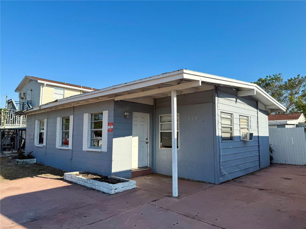 Photo of 310 79th Avenue, St Pete Beach, FL 33706 (MLS # TB8454013)