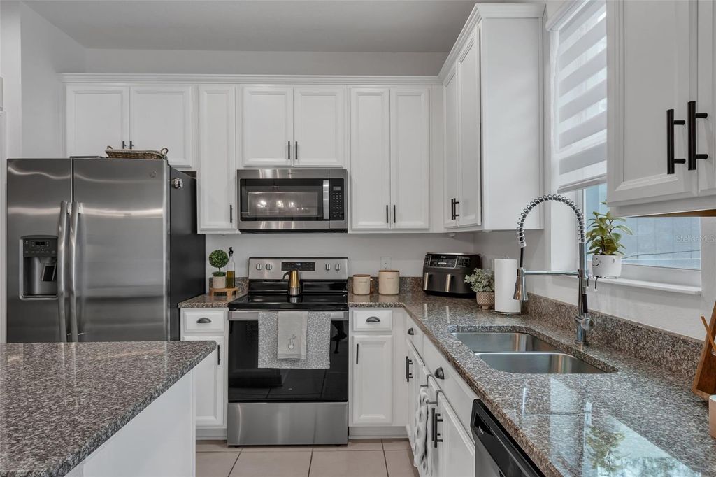 Photo of 4438 Gumbo Limbo Drive, Orlando, FL 32822 (MLS # G5109937)