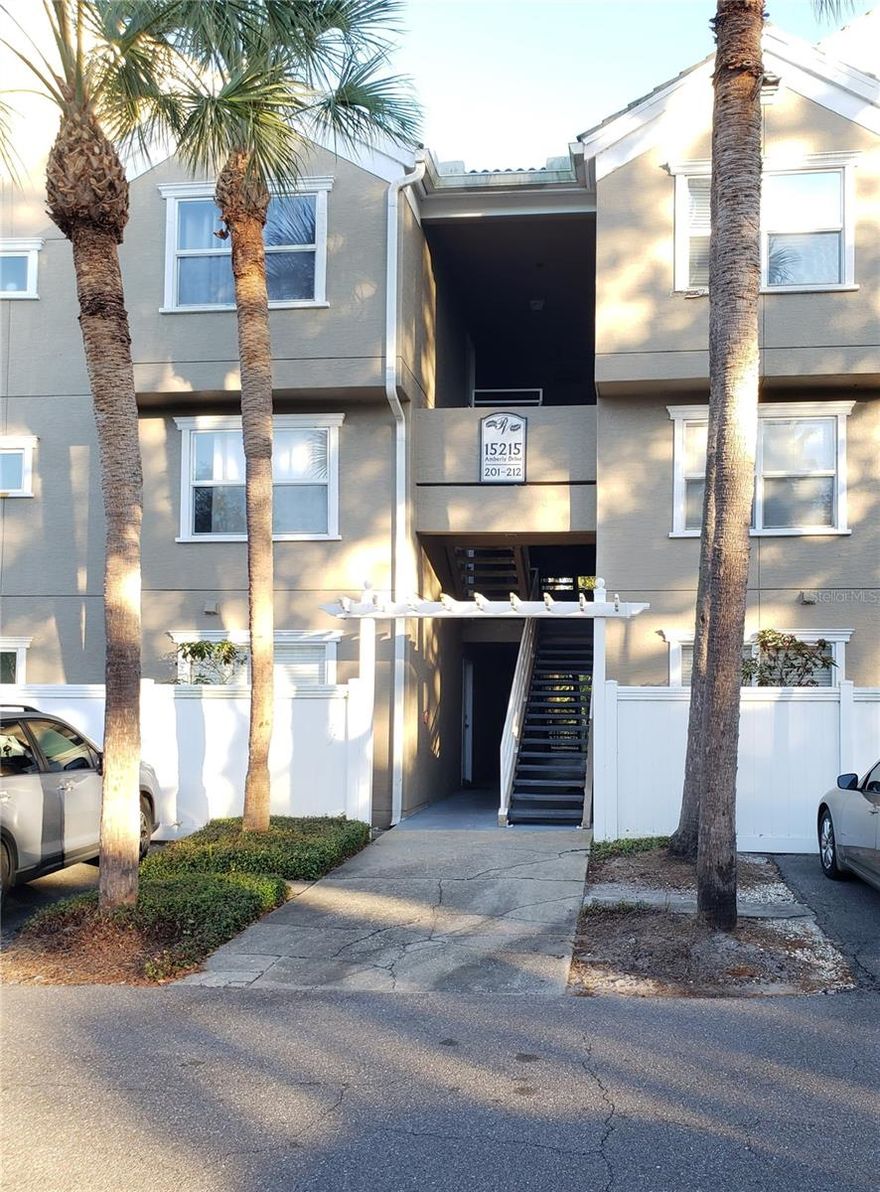 LOCATION, LOCATION, LOCATION! Welcome to this wonderful 2-bedroom, 2-bath condo in the highly sought-after Palma Vista at Tampa Palms - one of Tampa's PRIME LOCATIONS! This spacious and stylish unit features an open floor plan with tasteful upgrades throughout, including granite countertops, stainless steel appliances, and tile and wood flooring - NO carpet! Enjoy relaxing in the enclosed balcony with windows, adding extra living space year-round. The primary suite offers a beautifully tiled step-in shower, while the secondary bedroom includes a shower/tub combo - perfect for guests or family. The home comes complete with all major appliances, including a stackable washer and dryer. INCLUDES WATER AND SEWER in the rent! Located in Palma Vista, a quiet gated community, residents enjoy access to a sparkling swimming pool, fitness center, and ample guest parking. Just minutes from top-rated shopping, diverse dining, hospitals, medical offices, and all that New Tampa has to offer - this is easy living in an unbeatable location!