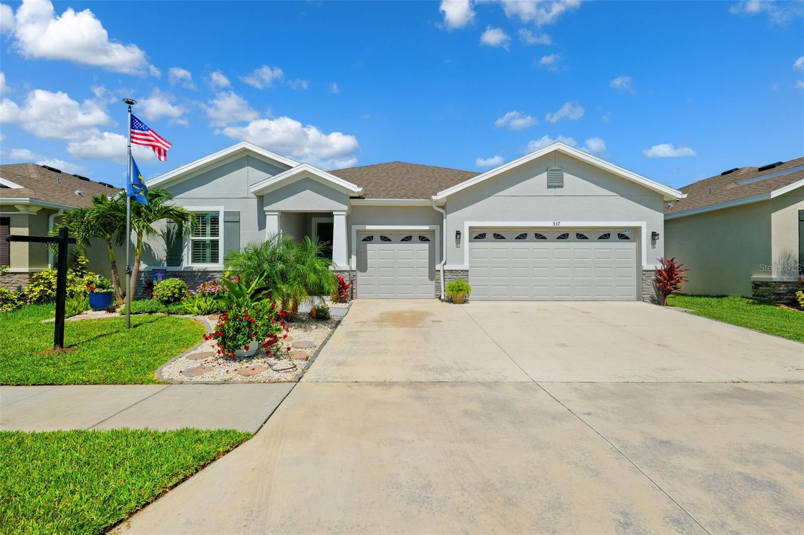 Welcome to Shell Cove! Above flood zone elevation! Always HIGH & DRY! Here is your opportunity to own a unique DR Horton built home which includes 4 bedrooms, 3.5 bathrooms, a 3-car garage, and MULTI- GENERATIONAL floorplan, with its OWN PRIVATE ENTRANCE! Step inside and enjoy the feel of this spacious open floorplan, with a favorable split bedroom design. TILE FLOORS AND TRAY CEILINGS THROUGHOUT and custom made window shades throughout! Two of the bedrooms are joined with a Jack and Jill bathroom, with a conveniently located half bathroom off of the entryway. The Mother-In-Law suite has a living room, Kitchenette with a full-size fridge, additional bedroom, and full bathroom, perfect for an extravagant guest suite or extended family! The main living space has a formal dining room, kitchen which overlooks the family room, and a den/flex room which can easily be utilized as an office or playroom! The kitchen has many appealing features, including a CENTER ISLAND WITH PENDANT LIGHTS, GRANITE COUNTERTOPS, TILED BACKSPLASH, STAINLESS-STEEL APPLIANCES, AND A WALK-IN PANTRY! The owner's suite is well-sized, with the ensuite bathroom featuring a DOUBLE SINK VANITY, GARDEN TUB, SEPARATE WALK-IN SHOWER, AND A WALK-IN CLOSET! Outside is an EXTENDED SCREENED IN LANAI FULLY COVERED WITH A PRIVACY FENCE! This wonderful community has a community pool, playgrounds, and basketball courts, and more! Don't miss out on this one, call today to schedule a private viewing!