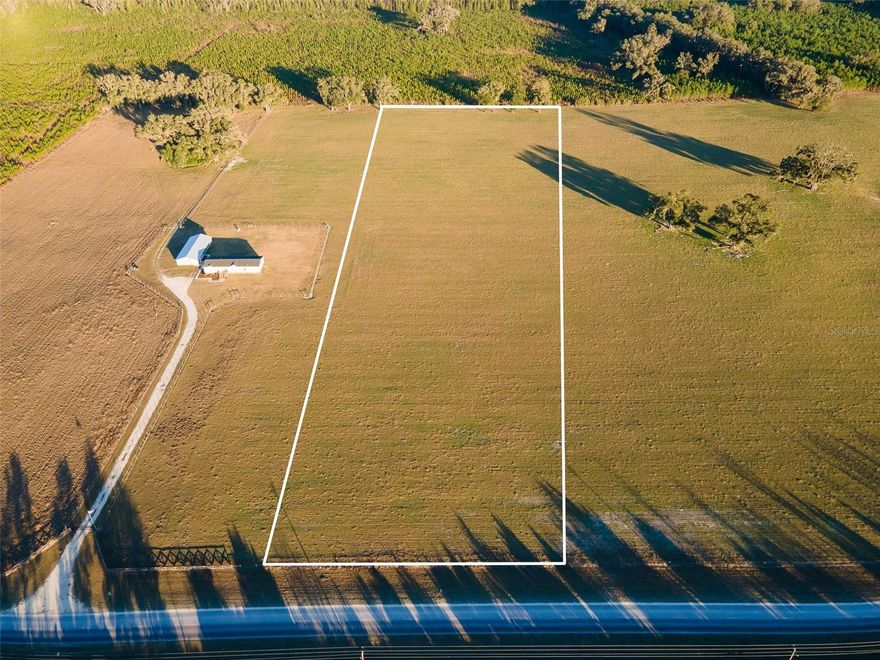 Welcome to Quarry Fields, a small, private subdivision featuring four 10-acre lots, located just 2.4 miles off Newberry Road on NW 202nd St. This listing is for Lot 3. This property features ideal pasture land, perfect for livestock, horses, or other agricultural pursuits. The 10-acre parcel may be purchased individually or alongside the three neighboring 10-acre parcels, offering potential to expand your estate, create a family compound, or pursue investment or agricultural opportunities. There is also potential to subdivide the land into 5 acre lots and further develop the land. Purchasing land in Quarry Fields gives you the opportunity to build your dream homestead—whether that means constructing a custom home, establishing farmland, or simply enjoying peaceful country living with room to breathe. All parcels have been subdivided into 10 acre tracts with county approved driveway permits giving each parcel direct access to NW 202nd St. Here, you’ll experience true peace and tranquility while remaining just minutes from shopping, hospitals, and all that Gainesville has to offer. Schedule your private showing today!