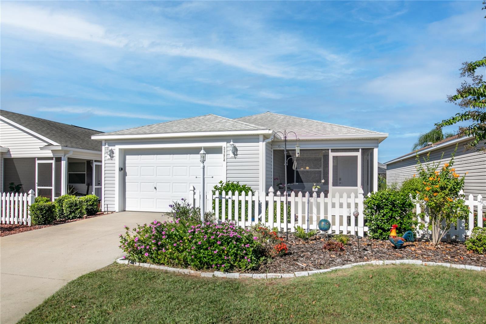 TURN KEY BOKEELIA VILLA IN THE VILLAGE of FERNANDINA - GOLF CART INCLUDED !
Move right in and start living The Villages lifestyle in this beautifully furnished Colony model Patio Villa located in the sought-after Village of Fernandina. This 2-bedroom, 2-bath home is completely turnkey — everything you need is provided, including your very own golf cart! Complete set up for Short Term Rental or easy move in.
Step inside to a bright open floor plan where the Kitchen overlooks the Dining and Living areas — perfect for entertaining or relaxing with family and friends. The Kitchen features Wood Cabinetry, spacious Countertops, a large Pantry Closet, Breakfast Bar, and a convenient interior Laundry Room with Washer & Dryer.
From the Living Room, Sliding Glass Doors open to a private Side Patio, ideal for outdoor dining or evening gatherings. Enjoy your morning coffee in the screened-in Lanai, taking in the Sunrise and peaceful Florida Breezes.
The Primary Suite offers a King-size Bed, large Walk-in Closet, and En Suite Bath with a step-in Shower. The Guest Bedroom is equally inviting, featuring a Queen-size Bed and easy access to the Second Full Bath.
Perfectly located between Brownwood Paddock Square and Lake Sumter Landing, you’ll have easy access to shopping, dining, and nightly live entertainment. Nearby Bradenton Recreation Center offers swimming, pickleball, tennis, billiards, and more. You’re also surrounded by Evans Prairie and Bonifay Country Clubs, all just a short golf cart ride away.
The Village of Fernandina isn’t just a place to live — it’s a lifestyle of fun, community, and endless recreation!