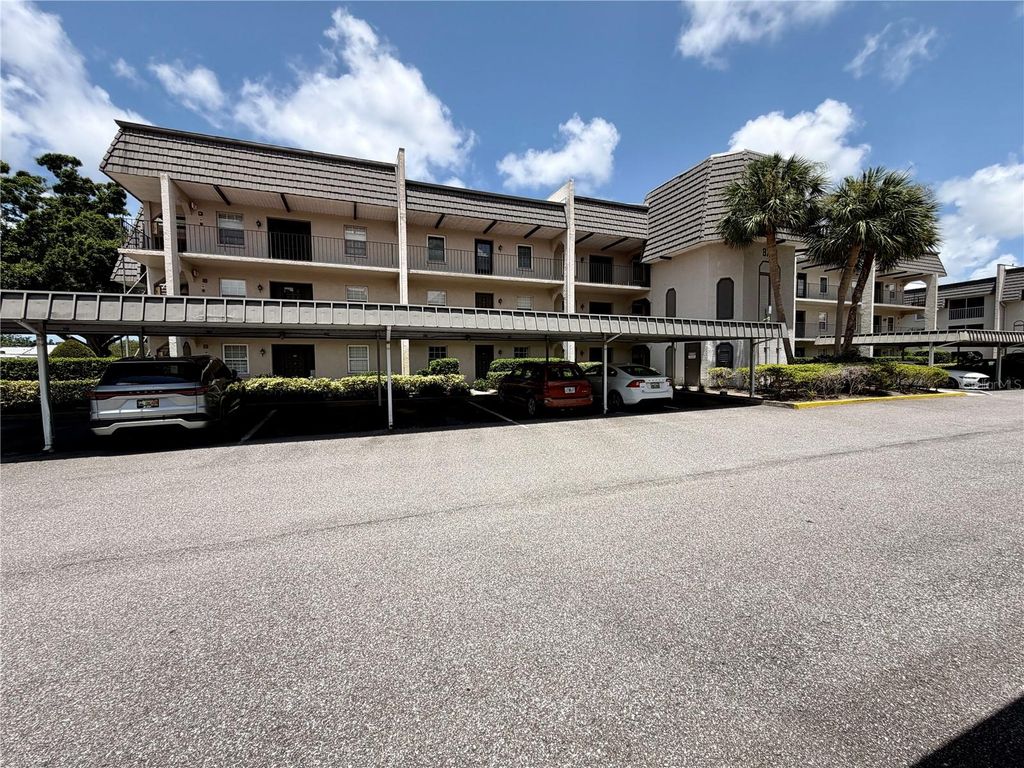 Photo of 8703 Bardmoor Boulevard #102, Seminole, FL 33777 (MLS # TB8521971)