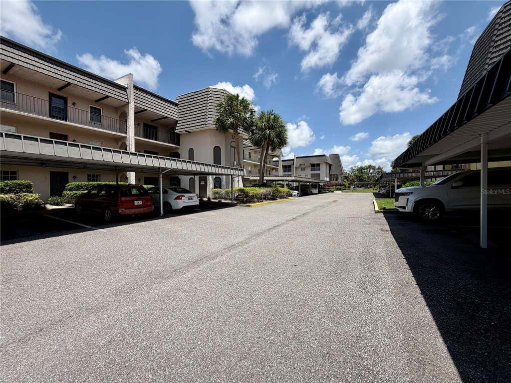 Photo of 8703 Bardmoor Boulevard #102, Seminole, FL 33777 (MLS # TB8521971)