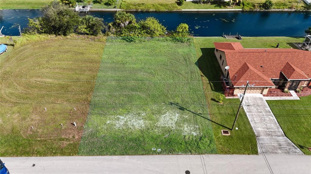 Photo of 633 SE 2nd Street, Cape Coral, FL 33990 (MLS # O6349843)