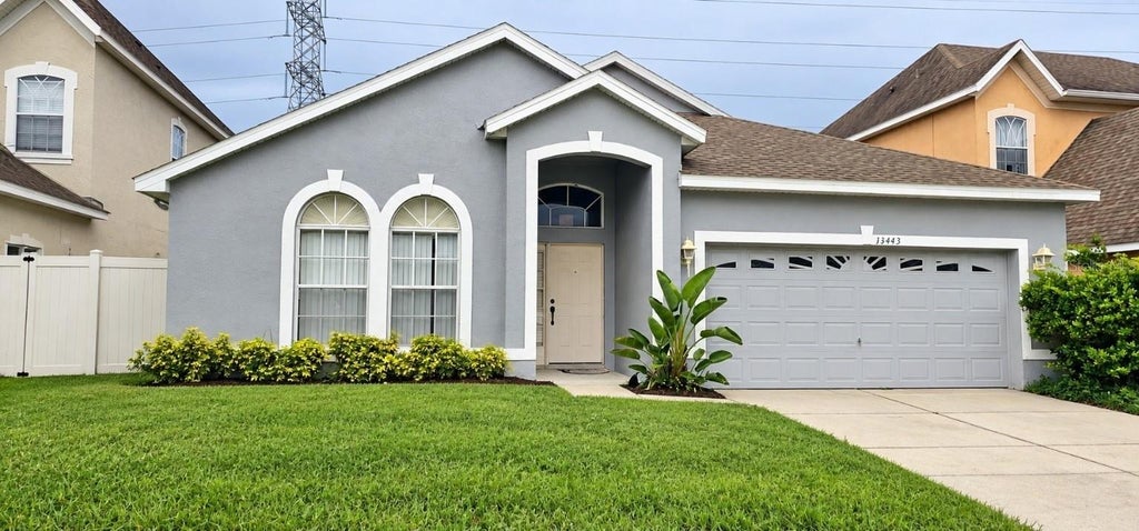 Photo of 13443 Meadow Bay Loop, Orlando, FL 32824 (MLS # S5158271)