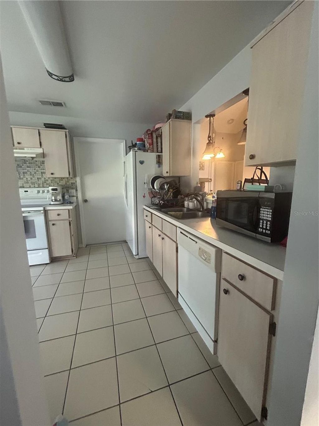 Photo of 8750 Fort Shea Avenue, Orlando, FL 32822 (MLS # O6403904)