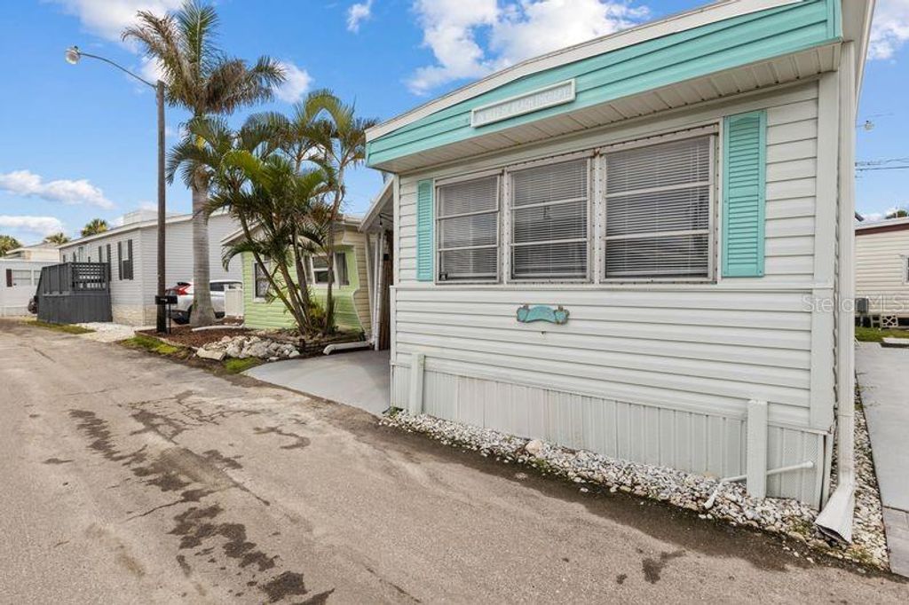 Photo of 2601 Gulf Drive N #317, Bradenton Beach, FL 34217 (MLS # A4650704)