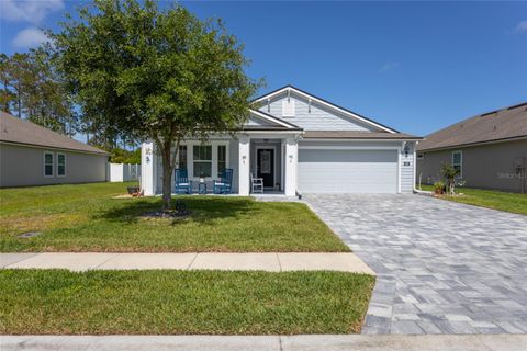 Photo of 146 S Hummingbird Place, Palm Coast, FL 32164 (MLS # FC318049)