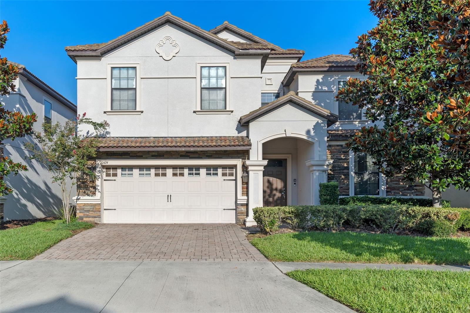 Step into the magical realm of this beautifully themed Disney-inspired income-generating property, located in the Champions Gate neighborhood of Davenport, Florida. The epic home features an impressive 9 bedrooms and 5 bathrooms, making it the perfect retreat for fun-seeking groups in search of an unforgettable vacation experience. With a 5-Star rating on Airbnb and Vrbo, this property brought in over $200K in short-term rental revenue 2024. And, investors will appreciate the financial potential of this property, showcasing an impressive 12.5% capitalization rate. With a strong history of rental income and high occupancy rates, this turn-key investment promises a consistent revenue stream. Moreover, this spacious, two-story home is designed to accommodate large groups, all strategically placed for easy access. Indoor/outdoor living is a must here with the seamless flow from the spacious family room to the large, screened-in outdoor lanai and pool. The multiple living areas both inside and out offer ample room for relaxation and entertainment, featuring comfortable seating, modern amenities and upgraded fixtures. The fully-equipped kitchen is a chef’s delight, outfitted with high-end appliances and plenty of counter space for preparing feasts for all. This amazing turn-key property includes a professional arcade and a spacious theater with an upgraded screen and surround sound, ensuring endless fun for the entire family. Each room is thoughtfully designed to immerse guests in the enchanting allure of Disney. From beloved characters adorning the walls to themed décor that evokes joy and nostalgia, every nook invites guests to create cherished memories. Outside, the private pool and spa area invites guests to unwind in its inviting waters and sun-kissed deck, providing a peaceful retreat after a day of exploring nearby attractions. The property includes its own website and social media presence, along with profiles on rental platforms, ensuring seamless management moving forward. Just a stone’s throw away from the Oasis Club at ChampionsGate, guests can take advantage of exclusive access to luxurious amenities like a lazy river, water slides, fitness center, and more. The close proximity to ChampionsGate’s golf courses and dining establishments ensures guests have everything they need for a lavish and memorable stay. Whether you’re looking to diversify your investment portfolio with a lucrative vacation rental or seeking a luxurious second home that pays for itself, this Disney-themed property in Champions Gate presents a rare opportunity to own a piece of themed paradise in the heart of Central Florida. Embrace the magic and consider this epic home as your next investment adventure!