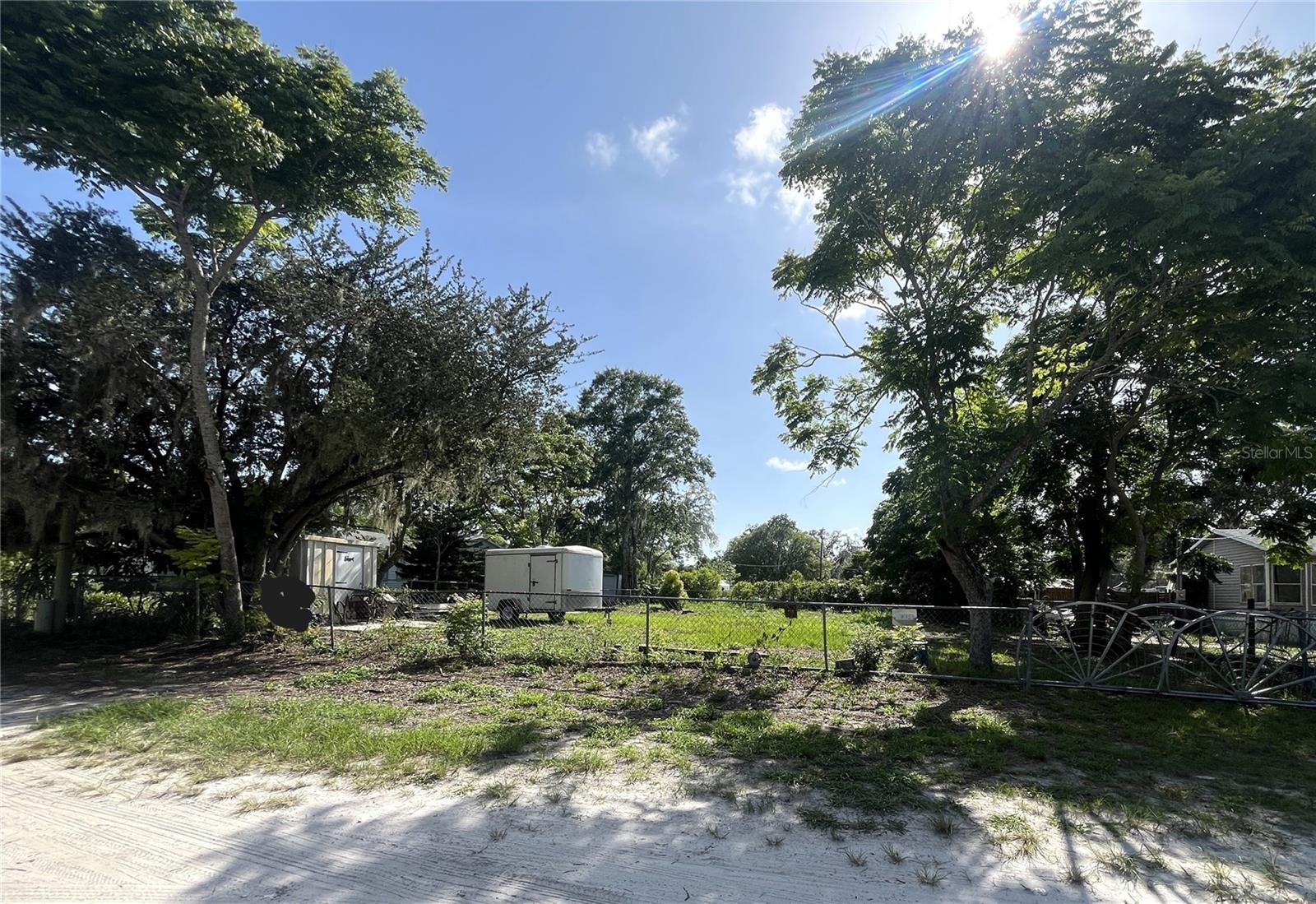 Ready-to-Build DOUBLE LOT available in New Port Richey. Seize this exceptional chance to acquire a completely cleared, BUILD-READY double lot in the expanding neighborhood of Moon Lake Estates! It is ideal for a single-family residence, mobile home, or manufactured home. This lot is equipped with an existing water well.