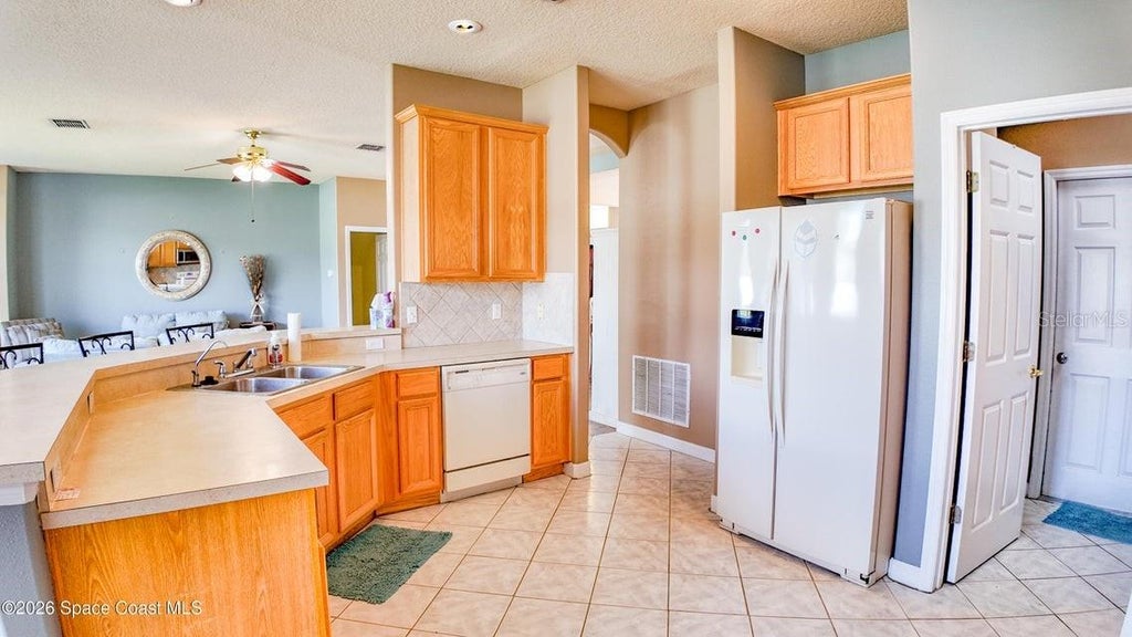 Photo of 3145 Twisted Oak Loop, Kissimmee, FL 34744 (MLS # O6448365)