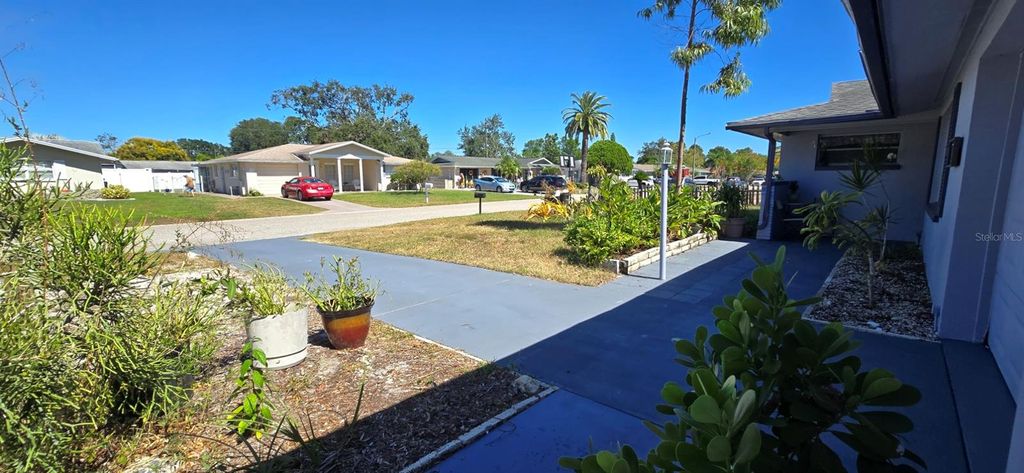Photo of 7520 Valencia Avenue, Port Richey, FL 34668 (MLS # W7879864)