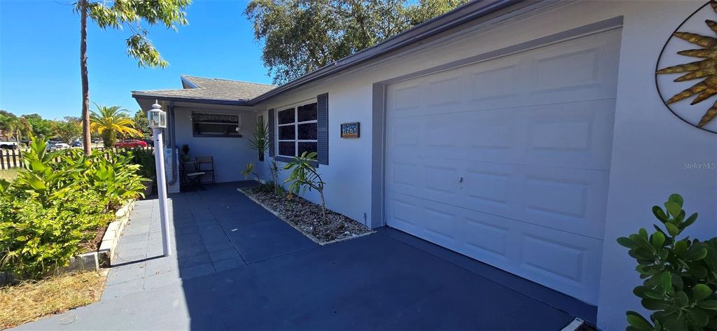 Photo of 7520 Valencia Avenue, Port Richey, FL 34668 (MLS # W7879864)