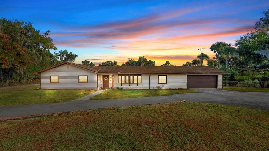 Welcome home to this 4-bedroom, 3-bath ranch-style property situated on nearly an acre in the highly desirable NO-HOA community of Grand Island. This move-in ready home features two master suites, an open-concept living area a chef’s kitchen with Whirlpool stainless-steel appliances, modern cabinetry and a waterfall granite island. Both master bathrooms has spa-like finishes including rain-head showers and Carrara marble vanities. Enjoy outdoor living with a fully screened patio, in ground pool, paved driveway, and a spacious detached out-building perfect for storage   With block construction, ample parking, and a private oversized lot, this home offers comfort, flexibility and privacy while still being close to local lakes, shopping and Central Florida amenities. This is Florida living at its finest—move-in ready and truly one of a kind.