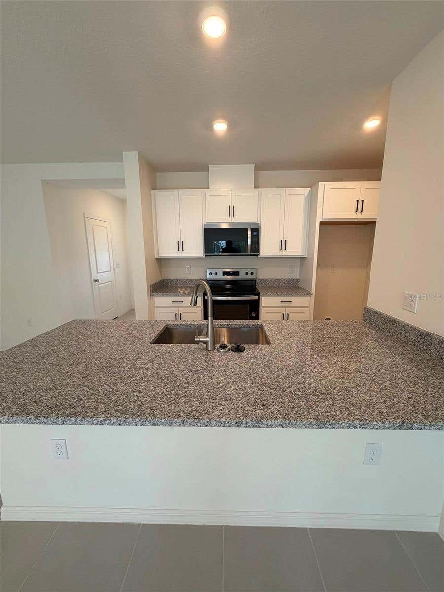 Photo of 16631 Luminary Loop, Clermont, FL 34714 (MLS # S5155749)