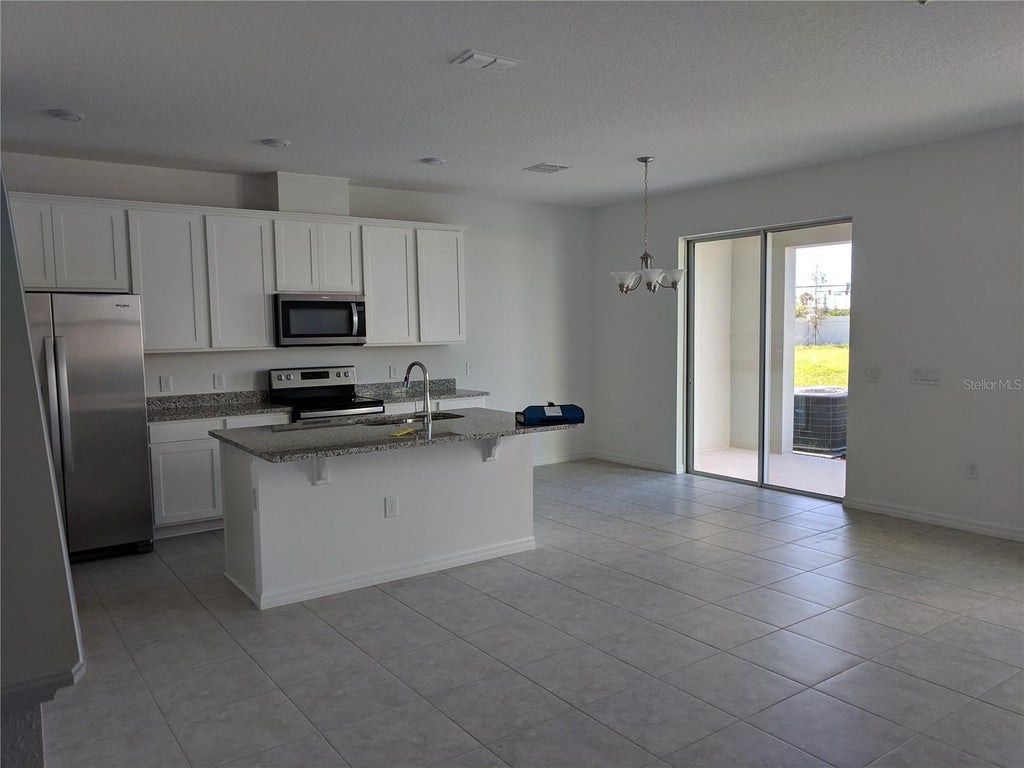 Photo of 15355 Willow Arbor Circle, Orlando, FL 32824 (MLS # O6442805)