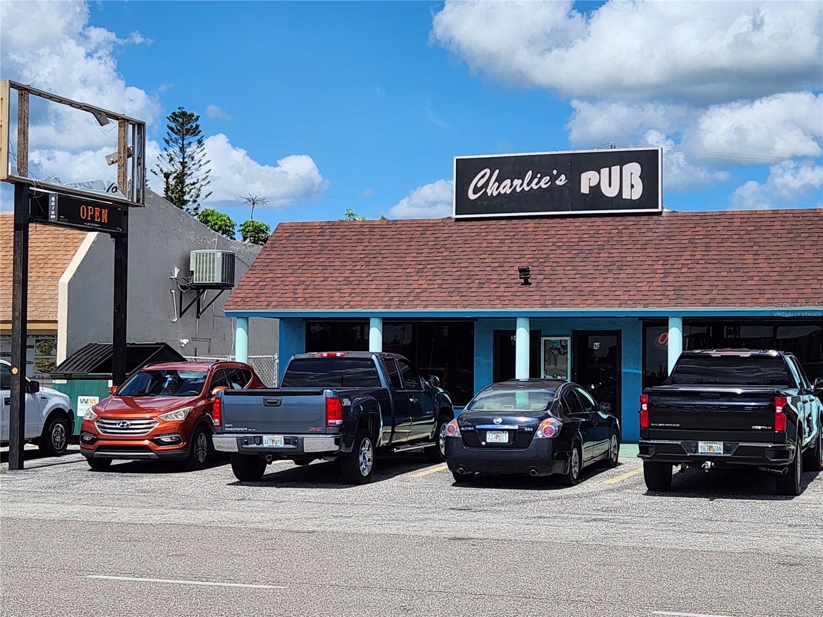 Charlies Pub is a well-establishment of 30 years in this highly visible location (Tamiami Trail). The property is surrounded by ample; businesses, neighborhoods, airport 8.5 miles away and average household income of ($69,508).
This excellent location is surrounded by stable demographics the population within this area Charlotte County is 194,908(2010 population was 159,978/ growth 21.83%); Gatorz Bar & Grill, Chubby’z Sports Grill & Tavern, All-Stars’ Bar and Restaurant, Port Side Bar, Fishermen’s Village and Sunseeker Resort. Charlotte County has penetrated purchasing power is ranked the fifth-largest area for population growth, according to data from the U.S. Census Bureau.
Charlies Pub as you enter you will see opening concept setup; Bar top/wall, multiple televisions, comfortable seating, and a variety of food and drink options ; they offer pool tables, Bowling so whether you're looking to catch the big game or just relax with friends, it create a good ambiance for its patrons.
Investment opportunity offers significant long-term growth not currently being utilized. This establishment has potential to have entertainment in the bar and the beer garden in the rear. The kitchen has a new exhaust hood and is ready to serve. The license allows for the sale of package liquor to be taken out as well as catering liquor at events.