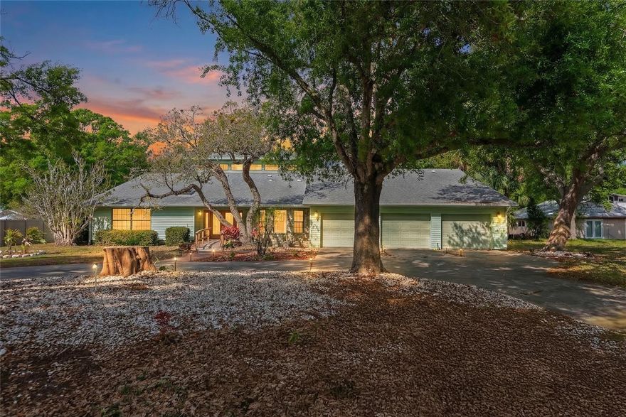 Discover the perfect blend of space, character, and freedom in this stunning 4-bedroom, 2-bath pool home set on a sprawling half-acre lot with no HOA or deed restrictions. From the moment you step inside, you’ll be captivated by the soaring ceilings in the main living area, beautifully accented with rich tongue-and-groove woodwork that adds warmth and architectural charm. At the heart of the home, a striking double-sided fireplace creates a unique focal point, elegantly dividing the cozy family room from the inviting sunken living room—ideal for both relaxing evenings and entertaining guests. The open layout offers a seamless flow, while large windows invite in natural light and views of your private outdoor oasis. Step outside to enjoy your own backyard retreat, complete with a large screened in pool and plenty of room to roam, garden, or store your toys—boats, RVs, and more are all welcome here. This property offers the rare combination of privacy, space, and distinctive design, making it truly one of a kind. This home also boasts a recently added Generac whole house generator with buried 500-gallon tank for peace of mind during storm season.   Don’t miss the opportunity to own a home where comfort meets character, all without the limitations of HOA living.