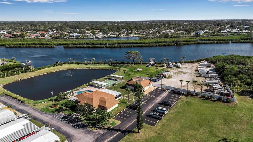 Discover the ultimate retirement lifestyle in this serene 55+ community at Terra Cove, where the love of water meets the joy of relaxation. This waterfront haven offers a private dock, boat ramp, and kayak launch, making it perfect for water enthusiasts. With private storage available for an additional fee, you can easily store your gear and enjoy Shackett Creek's easy boat access to waterfront restaurants, beaches, and the Gulf. This charming 2 bedroom, 2 bath home is located on a corner lot and is being sold turnkey furnished, ready for its new owner to move in and start enjoying the Florida lifestyle. The home features newer appliances, including a refrigerator, dishwasher, stove, washer, and dryer. It also boasts newer sliders, replaced interior doors, and updated flooring with vinyl planking in the primary bedroom and newer carpet in the living room. In 2024, a new AC unit was installed, ensuring comfort year-round. Both bedrooms have large walk-in closets, providing ample storage space. The front lanai is perfect for entertaining or relaxing while enjoying the breezes and outdoor dining. Low HOA fees cover the community pool, shuffleboard, clubhouse, lawn maintenance, and a "borrow a tool" amenity for owners. Please note that pets are not allowed. Terra Cove is conveniently located near Nokomis Beach, the Legacy Trail, I-75 access, and Sarasota Memorial Hospital-Venice. It is also close to restaurants, shopping, and area golf courses, making it an ideal location for retirees who love the water and the Florida lifestyle.