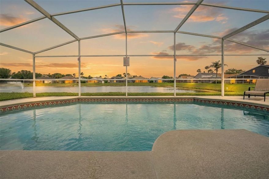 Beautiful FULLY FURNISHED 5-bedroom, 4-bath WATERFRONT POOL HOME located in the desirable Hampton Lakes community - known for its mature tree-lined streets and convenient access to Central Florida’s most popular attractions. Community permits short term renting making this the ideal income property or 2nd home. Have peace of mind knowing the ROOF was completely replaced (2024) This spacious home features a versatile layout with two primary suites on the first floor, an open-concept living area with vaulted ceilings, and three additional bedrooms upstairs for added privacy and flexibility. Enjoy relaxing on the screened and extended pool deck overlooking the lake, complete with a fountain view that creates a peaceful setting day or night. Hampton Lakes offers residents access to a playground, tennis court, and basketball court, and is ideally situated just minutes from Disney World, Universal Studios, SeaWorld, major shopping, dining, and everyday conveniences. Whether used as a primary residence, vacation home, or income-producing property, this home offers an excellent opportunity in a prime location.