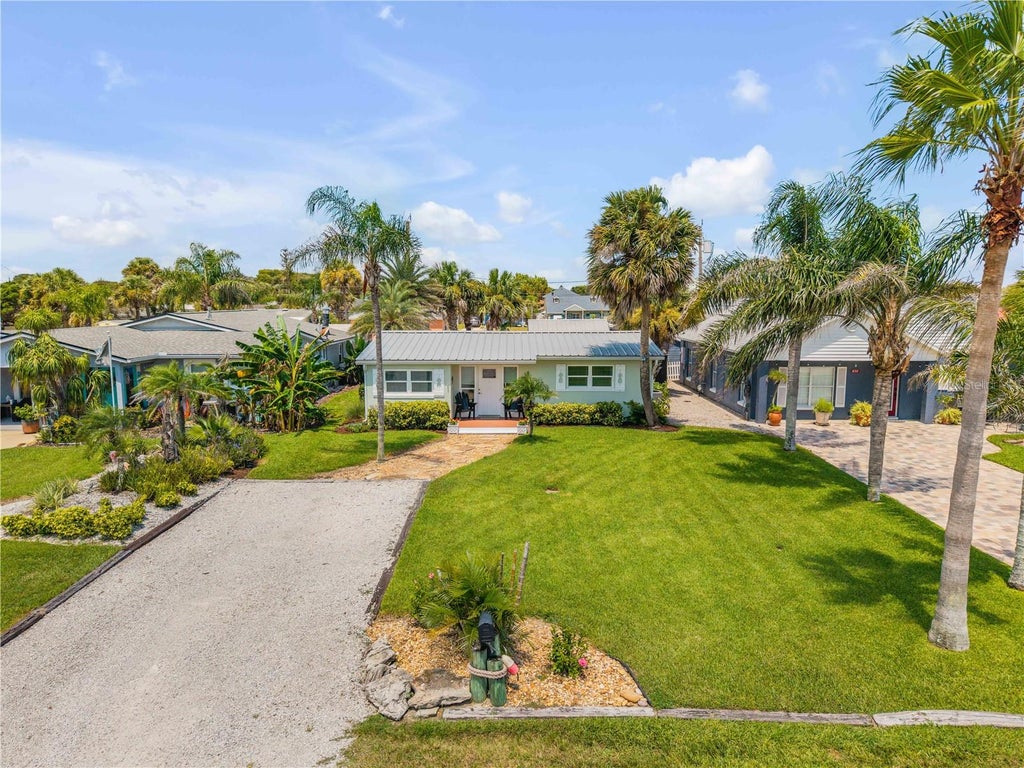 Photo of 828 E 25th Avenue, New Smyrna Beach, FL 32169 (MLS # NS1089053)
