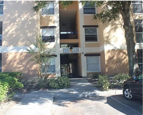 Photo of 7606 Pissarro Drive #14102, Orlando, FL 32819 (MLS # O6333849)