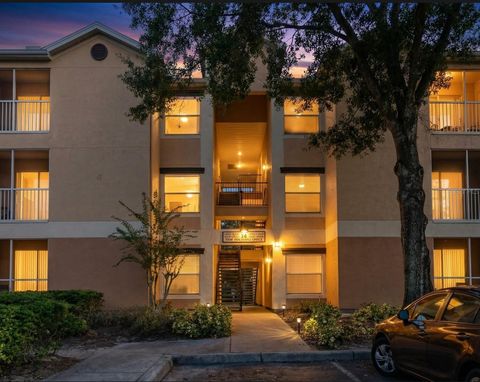 Photo of 7606 Pissarro Drive #14102, Orlando, FL 32819 (MLS # O6333849)