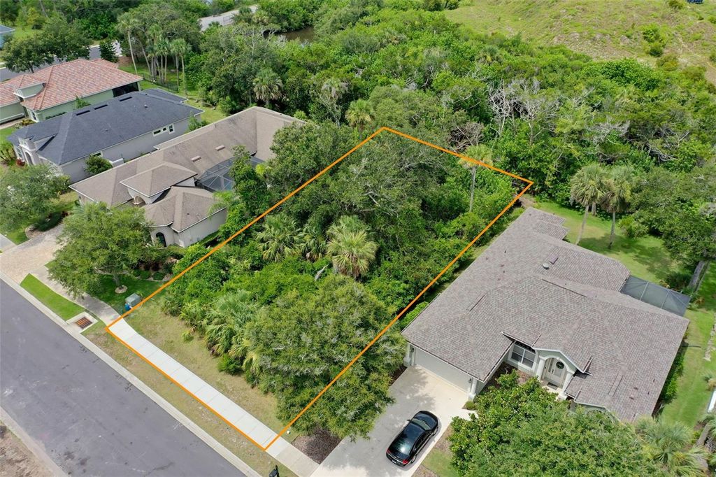Photo of 284 S Riverwalk Drive, Palm Coast, FL 32137 (MLS # FC311038)