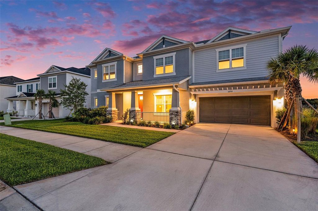Photo of 33774 Castaway Loop, Wesley Chapel, FL 33543 (MLS # TB8516987)