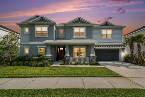 Photo of 33774 Castaway Loop, Wesley Chapel, FL 33543 (MLS # TB8516987)