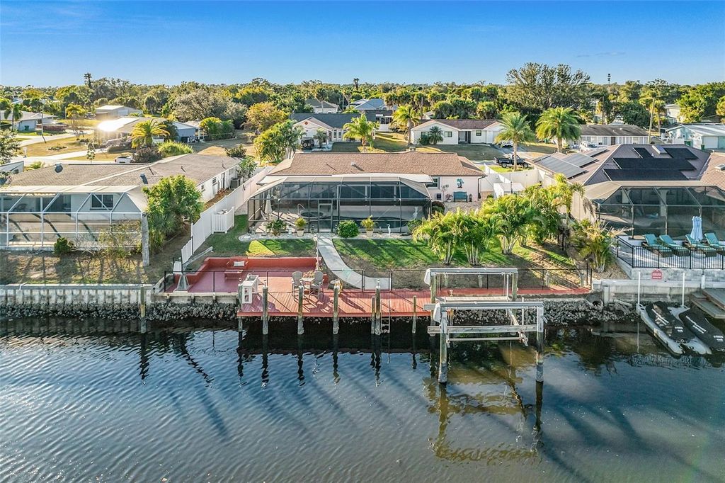 Photo of 4114 Yucatan Circle, Port Charlotte, FL 33948 (MLS # TB8464351)