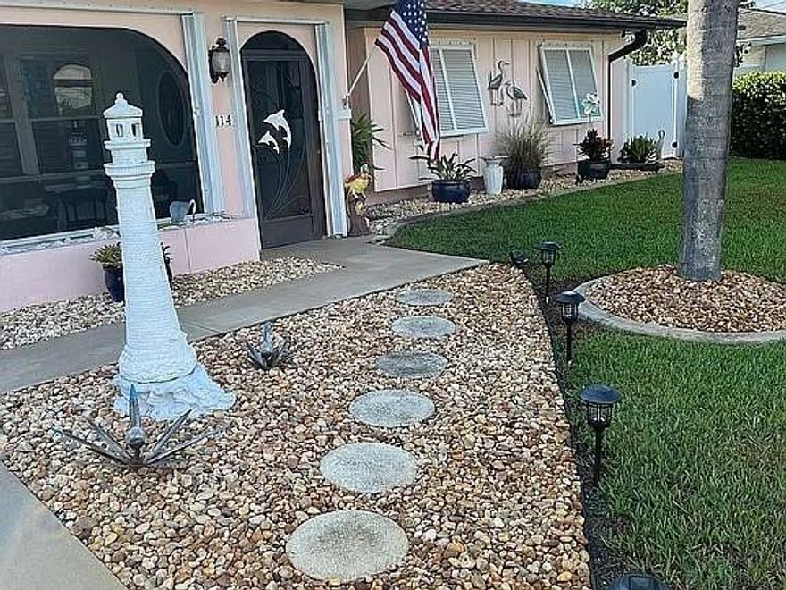 Exceptional waterfront location—truly a boater’s paradise. This updated 2-bedroom, 2-bath residence with a 2-car garage offers direct powerboat access to Charlotte Harbor and the Gulf of Mexico, with open water reachable in approximately 10 minutes. Situated on 80 feet of waterfront, the property features a 37-foot dock equipped with water, electric, and a 10,000-lb boat lift.

Designed for outdoor living and entertaining, the home boasts a saltwater pool and spa with beach entry and built-in seating, newly tiled and resurfaced in 2021, all overlooking a wide saltwater canal with desirable eastern exposure. The patio includes both a covered lanai with an electric roll-down privacy screen and an enclosed Florida room with retractable vinyl windows, allowing for year-round enjoyment.

Inside, the open-concept floor plan is enhanced by plantation shutters and a well-appointed kitchen featuring quartz countertops, stainless steel appliances, glass tile backsplash, a decorative wood ceiling, and breakfast bar. The primary suite offers an ensuite bath with walk-in shower, while the spacious guest bedroom includes a double closet and an updated bath with Roman shower.

Additional highlights include a screened front entry with inviting porch—perfect for sunset views—screened garage, fully fenced backyard with a 6x9 storage shed, whole-house Generac generator with two oversized propane tanks, brand-new air conditioning system, well irrigation for the yard, accordion and Bahama hurricane shutters, and newer roof and dock.

Ideally located near Port Charlotte Beach Park, Sunseeker Resort, and historic downtown Punta Gorda, this home provides convenient access to dining, shopping, parks, community events, and world-class fishing and boating. Gulf Coast beaches are just a short drive away.

An outstanding opportunity to enjoy the ultimate Florida waterfront lifestyle. Furniture may be purchased separately and is negotiable. Schedule your private showing today.