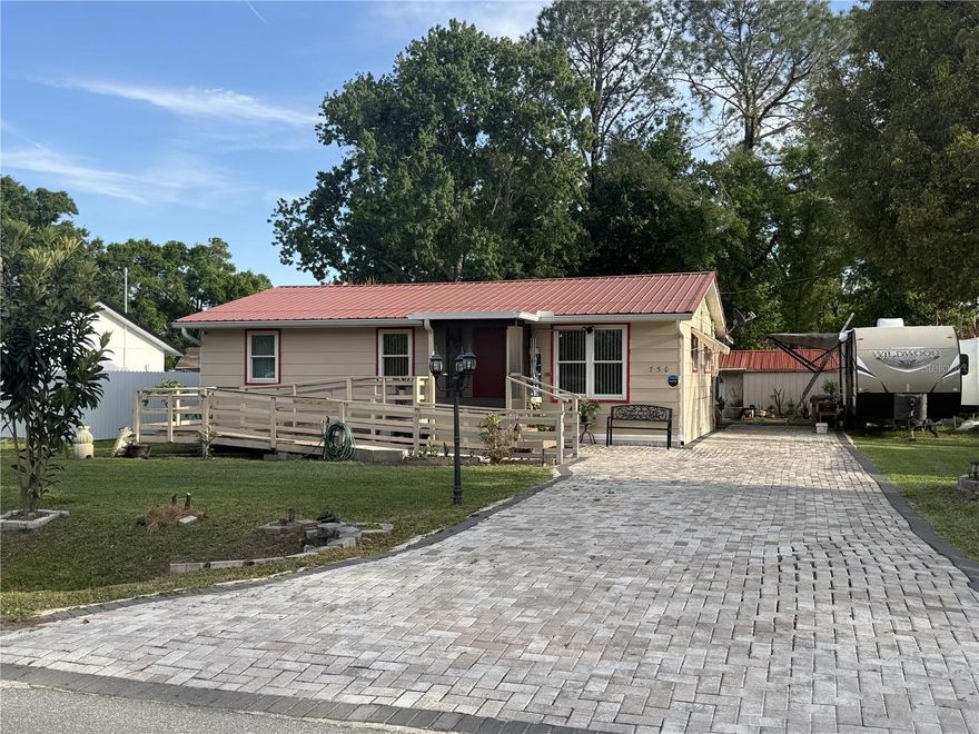 Discover this beautifully renovated home, perfect for living or investing, 2 Bedrooms | 1 Bath, Spacious Living & Dining Room. Brand-new kitchen with granite countertops, Fresh interior & exterior paint. Charming front & Back porch to enjoy your mornings. Elegant pavers! New metal roof! NO HOA! Prime opportunity in Kissimmee? Ideal for first-time buyers or investors. Schedule your private showing today! Wheel Chair Ramp, Dead-End. Community Allow 1 RV at the property!