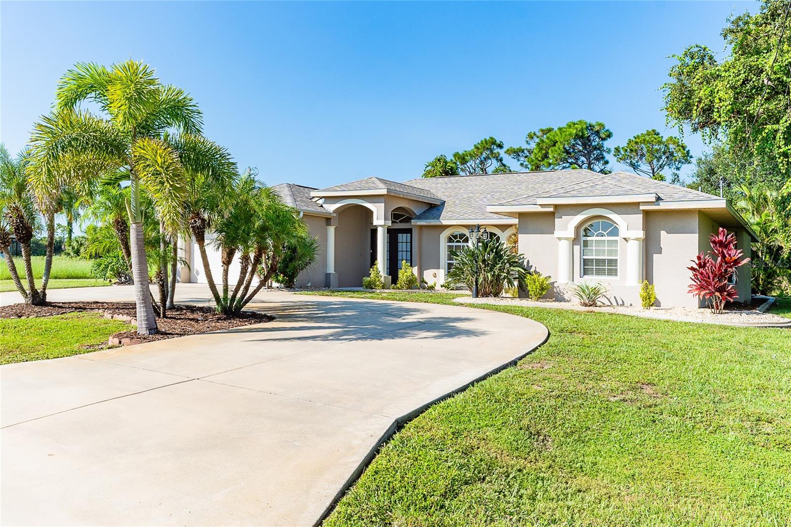 Turnkey Pool Home in Rotonda West – Minutes to Boca Grande Beaches! Welcome to your move-in ready 4 Bedroom, 3 Bathroom, 2-Car Garage pool home located in the sought-after golfing community of Rotonda West, nestled on the beautiful Cape Haze Peninsula. This fully furnished residence offers Florida living at its finest, just a short drive from the world-class beaches of Boca Grande and Englewood. This spacious home features a new roof in 2023, and an ideal open split floor plan with not one, but two master suites, each with private ensuite bathrooms, walk-in closets, and direct access to the screened-in, heated pool and lanai. One suite offers a king bed, the other a queen—perfect for guests or multi-generational living. Two additional guest bedrooms (each with twin beds and walk-in closets) share a full hallway bath with direct pool access, ensuring everyone has their own space and convenience. Entertain effortlessly with a formal living and dining area, or gather in the updated eat-in kitchen, complete with granite countertops, stainless steel appliances, and a breakfast bar—all with easy access to the outdoor oasis. Enjoy privacy and tranquility with a lush greenbelt behind the home, creating a peaceful backdrop for relaxing poolside or dining al fresco under the covered lanai. This home also boasts a strong rental history, making it a fantastic investment opportunity.
Offered fully furnished and turnkey, this property includes everything you need: TVs, indoor and outdoor furniture, kitchenware, linens, towels, pool floats, grill, bikes, golf clubs, and more—just bring your suitcase! Located in the heart of the Cape Haze Peninsula, you’ll be minutes from Gulf beaches, boating, championship golf courses, marinas, boutique shopping, and waterfront dining. Catch a game at CoolToday Park, enjoy the vibrant arts and culture of nearby Venice, or explore the historic village of Boca Grande just over the causeway. Why wait? Start enjoying the Southwest Florida lifestyle today in this beautifully maintained, ready-to-enjoy home.