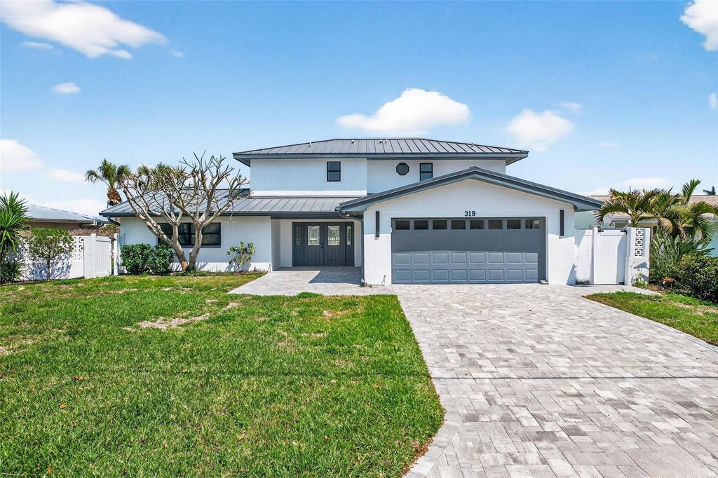 Photo of 319 Midway Island, Clearwater, FL 33767 (MLS # O6442148)