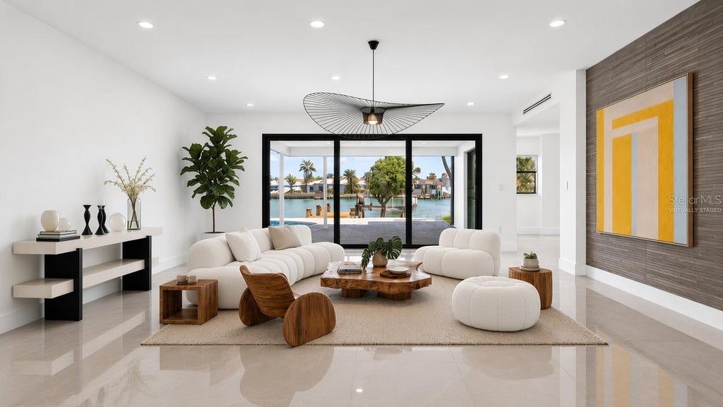Photo of 319 Midway Island, Clearwater, FL 33767 (MLS # O6442148)