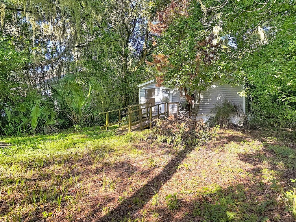 Photo of 8216 Simpson Lane, Lakeland, FL 33809 (MLS # O6434671)