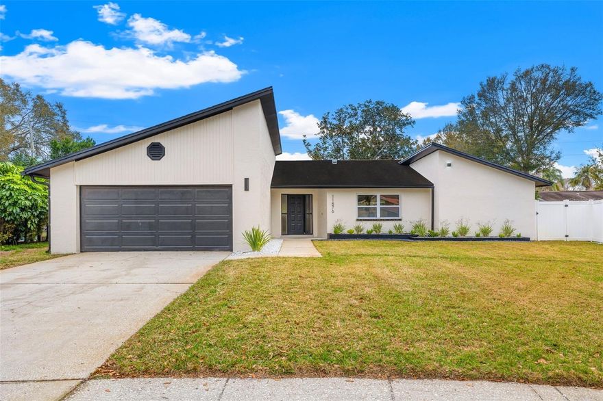 Welcome Home to your own private oasis tucked away at the very end of a quiet cul-de-sac in the highly sought-after Seminole Country Estates. This beautifully updated 3-bedroom, 2-bathroom pool home offers 1,758 square feet of modern luxury and the ultimate relaxed Florida lifestyle. From the moment you step inside, you’ll notice the seamless open floor plan and high-end finishes designed for effortless entertaining. The heart of the home is a stunning chef’s kitchen featuring elegant waterfall quartz countertops, new stainless steel appliances, and an oversized island that comfortably seats four. Adjacent to the kitchen, the dedicated dining space is perfect for large gatherings, while the living room serves as the ultimate hangout spot with a custom dry bar and built-in wine fridge. Retreat to the private primary suite, which boasts its own sliding door access to the lanai, a walk-in closet, and a designer bathroom featuring a large standing shower and modern LED-lit mirrors. Two additional generous bedrooms share a stylishly updated second bath, providing plenty of room for family or guests. Step through the large sliders to discover your screened-in lanai and a sparkling resurfaced pool with new tile, all set within a fully fenced-in backyard. Peace of mind comes standard here with all-new impact-rated windows and a brand-new 2024 roof. Located in Flood Zone X, this home is perfectly positioned just minutes from world-class Gulf beaches and the vibrant shopping and dining at the new Seminole City Center and the brand-new Fresh Market opening just down the street. With Downtown St. Pete and Tampa only 30 minutes away, this move-in-ready gem truly has it all.