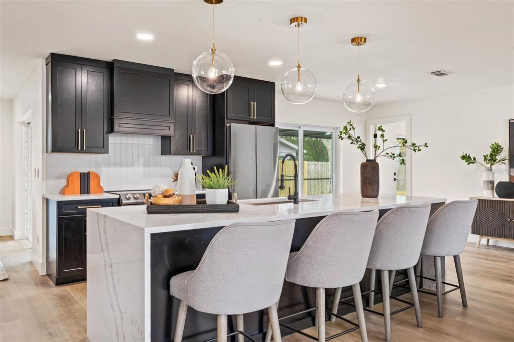 Photo of 11876 Marla Lane, Seminole, FL 33772 (MLS # TB8478372)