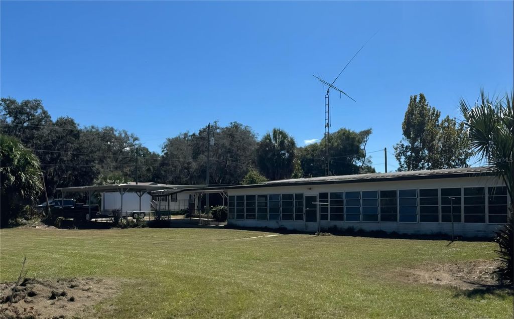 Photo of 13046 SE 102nd Terrace, Ocklawaha, FL 32179 (MLS # OM710357)